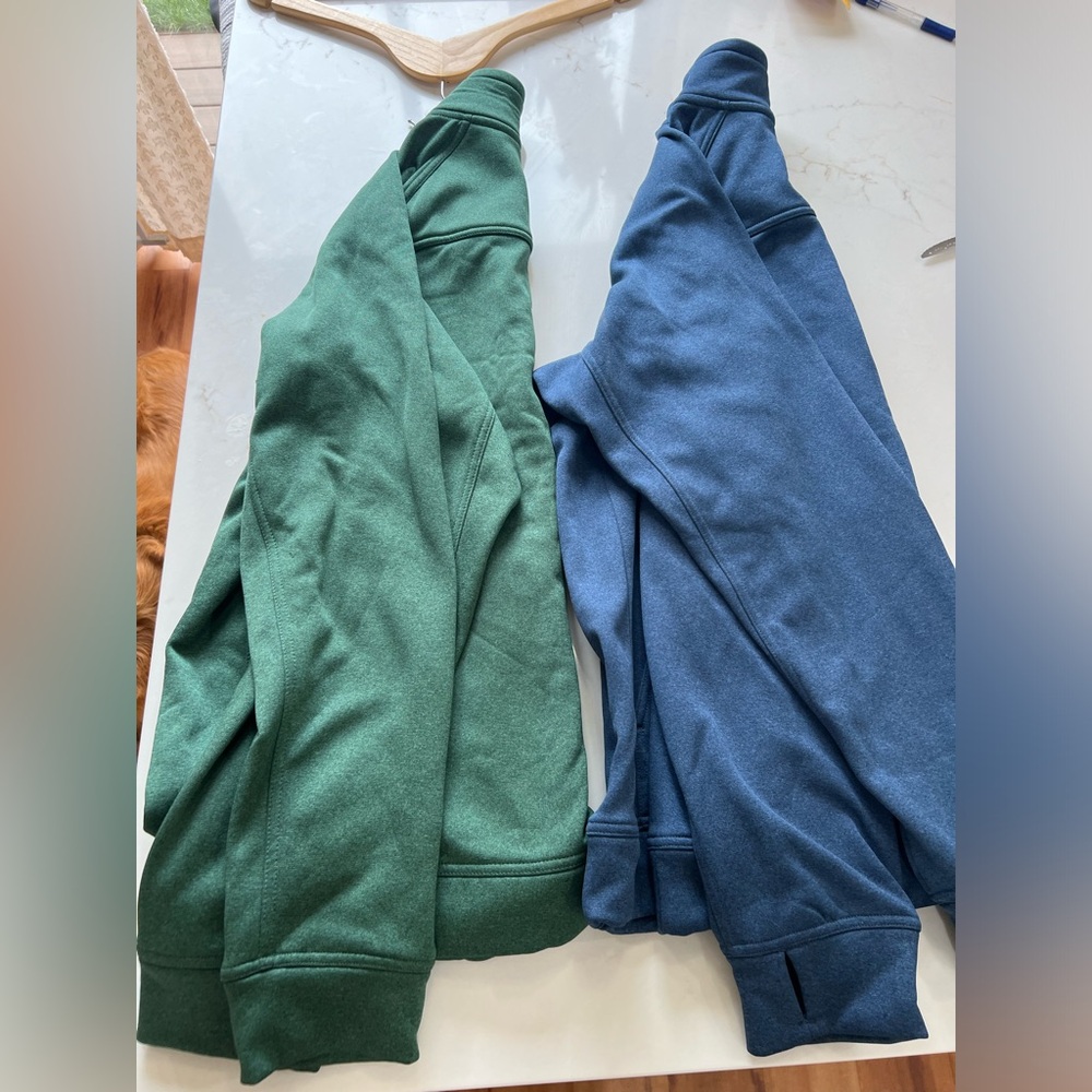 Two Duluth jackets blue and green in large